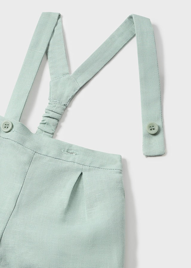 Conjunto peto corto y camisa.