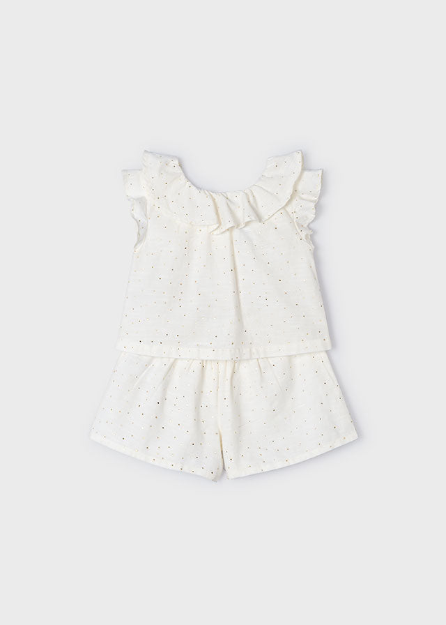 Conjunto blusa y bermuda.