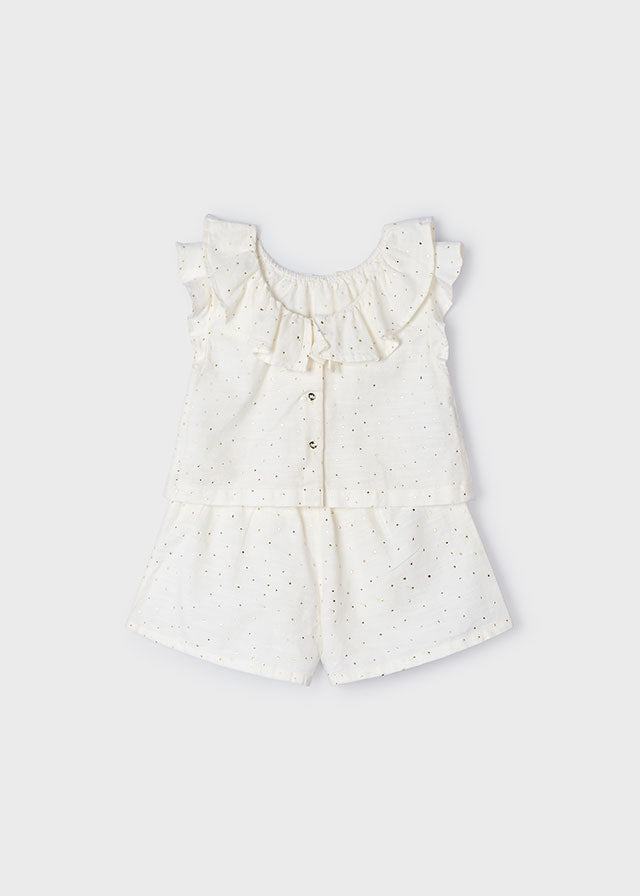 Conjunto blusa y bermuda.