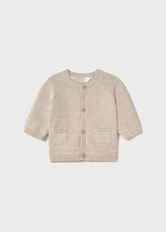 Cardigan tricot en color beig.