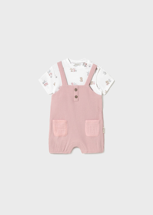 Pelele peto en color rosa.